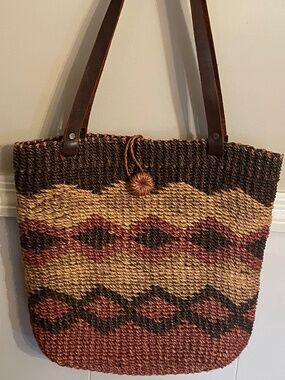 Boho-style woven and leather market tote